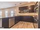 Modern kitchen with granite countertops, stainless steel appliances, and a spacious island at 220 Fern Dale Dr # 71, Fairburn, GA 30213