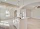 Modern kitchen boasts stainless appliances, white cabinets, and a center island perfect for entertaining at 221 Ruthe Cv, Locust Grove, GA 30248