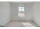 Walk-in closet with carpet, natural light and metal shelving at 221 Ruthe Cv, Locust Grove, GA 30248