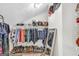 Organized walk-in closet with ample storage for clothing, shoes, and accessories at 2694 Greentree Se Dr, Marietta, GA 30067