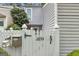Exterior showing a white fence with black numbers for the house address, mailbox, and the fence details at 2694 Greentree Se Dr, Marietta, GA 30067