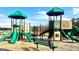 Community playground featuring slides, climbing structures, and shaded areas for enjoyment and recreation at 506 Alford Cv # 89, Fairburn, GA 30213