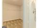This walk-in closet has wire shelving and patterned carpeting at 506 Alford Cv # 89, Fairburn, GA 30213