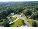 An aerial view of a neighborhood featuring well-maintained homes surrounded by lush greenery and mature trees at 1612 Cagle Ct, Lawrenceville, GA 30045