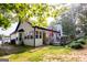 This home offers a beautiful backyard featuring a wooden deck, perfect for relaxing and outdoor entertaining at 1612 Cagle Ct, Lawrenceville, GA 30045