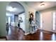 Spacious foyer with hardwood floors, leading to the kitchen and dining areas at 1612 Cagle Ct, Lawrenceville, GA 30045