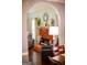 Living room featuring a brick fireplace with decorative Halloween accents and hardwood floors at 1612 Cagle Ct, Lawrenceville, GA 30045