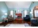 Inviting living room with a brick fireplace, stylish decor, and comfortable seating at 1612 Cagle Ct, Lawrenceville, GA 30045