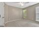 Neutral bedroom with soft carpet, a window, and ample natural light at 240 Turnbridge Cir, Peachtree City, GA 30269