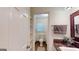 Cozy bathroom with a toilet, open shelves, and decorative elements at 100 Willow Wood Road, Social Circle, GA 30025