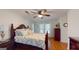 Bedroom with ceiling fan, hardwood floors, and lots of natural light at 100 Willow Wood Road, Social Circle, GA 30025