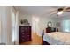 Bedroom featuring wood floors, ceiling fan, and natural light at 100 Willow Wood Road, Social Circle, GA 30025