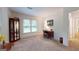 Bedroom with a traditional wooden desk and hutch near a window for natural light at 100 Willow Wood Road, Social Circle, GA 30025