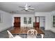Traditional dining room with a wooden table, stylish chairs, and a decorative china cabinet at 100 Willow Wood Road, Social Circle, GA 30025