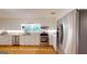Kitchen features stainless steel appliances, white cabinets and granite counters at 100 Willow Wood Road, Social Circle, GA 30025