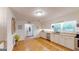 Bright kitchen with granite countertops and stainless steel appliances at 100 Willow Wood Road, Social Circle, GA 30025