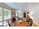 Cozy living room with a fireplace and a dining area near the window at 100 Willow Wood Road, Social Circle, GA 30025