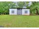 Large, well-maintained utility building on a grassy lot at 100 Willow Wood Road, Social Circle, GA 30025
