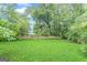 The backyard is fully fenced and provides ample green space at 489 Radar Dr, Hapeville, GA 30354