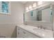 Bathroom features double vanity with marble countertop and subway tile backsplash at 489 Radar Dr, Hapeville, GA 30354