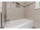Modern bathtub with tiled wall and shower niche at 489 Radar Dr, Hapeville, GA 30354
