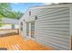 Wooden deck with access to the house through elegant French doors at 489 Radar Dr, Hapeville, GA 30354