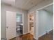 Hallway view into the bathroom, kitchen, and bedroom at 489 Radar Dr, Hapeville, GA 30354