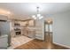 Modern kitchen features stainless steel appliances, granite countertops, and updated cabinetry at 489 Radar Dr, Hapeville, GA 30354