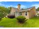 Well-maintained backyard featuring green lawn and mature landscaping offering a peaceful outdoor space at 130 Augusta Dr, Peachtree City, GA 30269