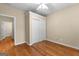 Clean bedroom with hardwood floors and closet at 130 Augusta Dr, Peachtree City, GA 30269