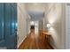 Warm foyer featuring hardwood floors and an inviting view into the living area at 130 Augusta Dr, Peachtree City, GA 30269