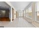 Open living room with lots of natural light and tile flooring at 130 Augusta Dr, Peachtree City, GA 30269