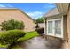 View of the private rear patio area surrounded by lush landscape at 130 Augusta Dr, Peachtree City, GA 30269