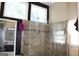 Bathroom featuring glass enclosed shower and soaking tub at 9342 Carillon Ct, Jonesboro, GA 30236