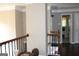 Hallway leading to bathroom with tiled floor at 9342 Carillon Ct, Jonesboro, GA 30236