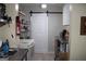 Kitchen features a white door, stainless steel tables and white oven at 9342 Carillon Ct, Jonesboro, GA 30236
