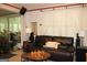 Cozy living room with a decorative chess board and comfortable seating at 9342 Carillon Ct, Jonesboro, GA 30236