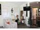 Comfortable living room with chair, and large television at 9342 Carillon Ct, Jonesboro, GA 30236
