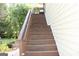 Exterior stairway provides access to the upper floors at 9342 Carillon Ct, Jonesboro, GA 30236