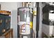 Close-up of a water heater in a utility area, showcasing its features and specifications at 9342 Carillon Ct, Jonesboro, GA 30236
