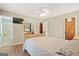 This bedroom features a ceiling fan, closet, and an en suite bathroom at 423 Mephisto Cir, Lawrenceville, GA 30046