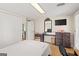 Inviting bedroom boasting hardwood floors, natural light, and ample storage in the closet at 423 Mephisto Cir, Lawrenceville, GA 30046