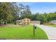 Beautiful two-story home with a well-manicured lawn and an attached two-car garage at 423 Mephisto Cir, Lawrenceville, GA 30046