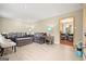 Inviting living room with recessed lights, laminate floors, and comfortable seating at 423 Mephisto Cir, Lawrenceville, GA 30046