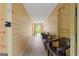 Enclosed porch with seating area and wood paneled walls perfect for relaxing at 423 Mephisto Cir, Lawrenceville, GA 30046
