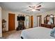 Relaxing bedroom with neutral tones, ensuite bathroom, and comfortable carpeting at 69 Trace Ct, Stockbridge, GA 30281