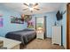 Bright bedroom featuring blue walls, plush carpeting, and comfortable bedding at 69 Trace Ct, Stockbridge, GA 30281