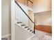 Open foyer with marble floors, a staircase with dark wood treads, and an open view of the living room at 155 Glenwood Ln, Fayetteville, GA 30215