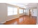 Bright living space featuring hardwood floors and large windows for natural light at 155 Glenwood Ln, Fayetteville, GA 30215