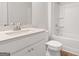 Bathroom featuring a modern vanity, sink, and toilet, offering a clean and functional space at 813 Dobby Way # 95, Mcdonough, GA 30252